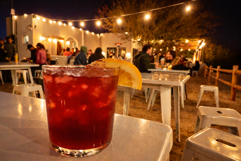 Mindful drinking culture and bar safety represented through craft cocktail service at Más o Menos